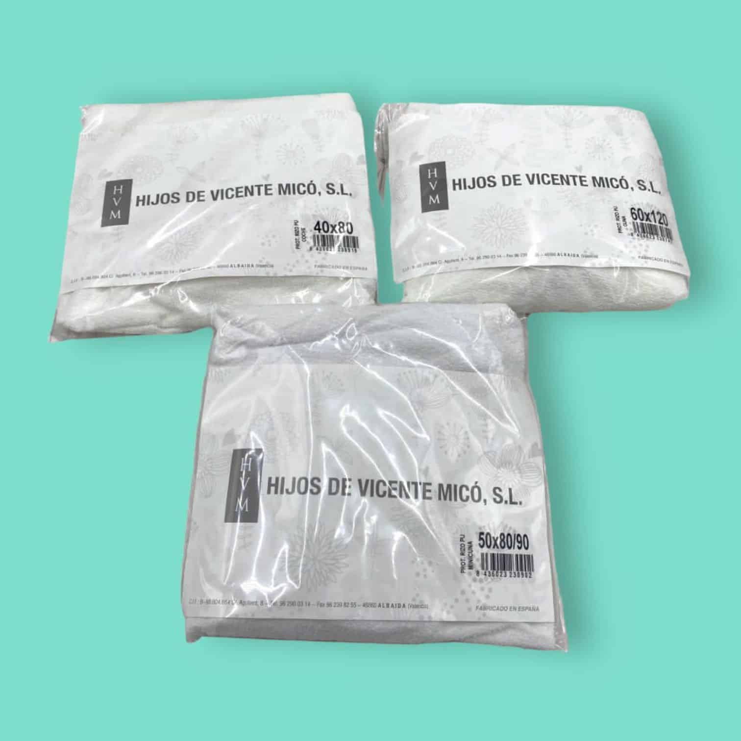 Protector ajustable de rizo plastificado.